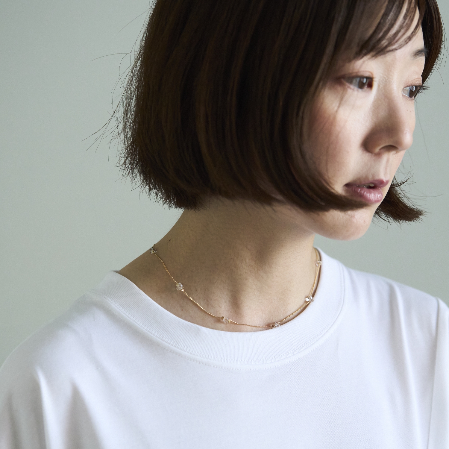 STELLA CIFFON/トライアングルビーズネックレス