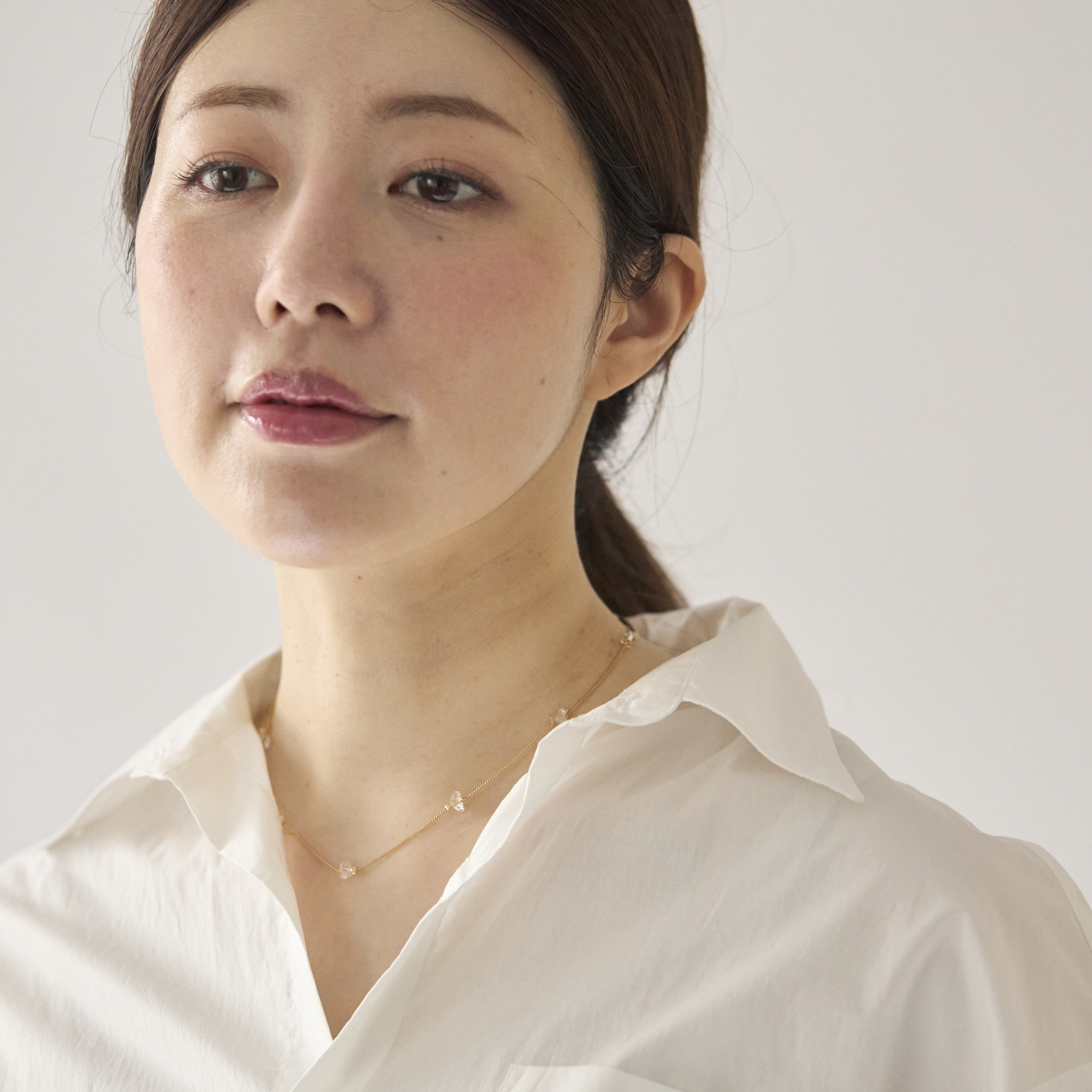 STELLA CIFFON/トライアングルビーズネックレス