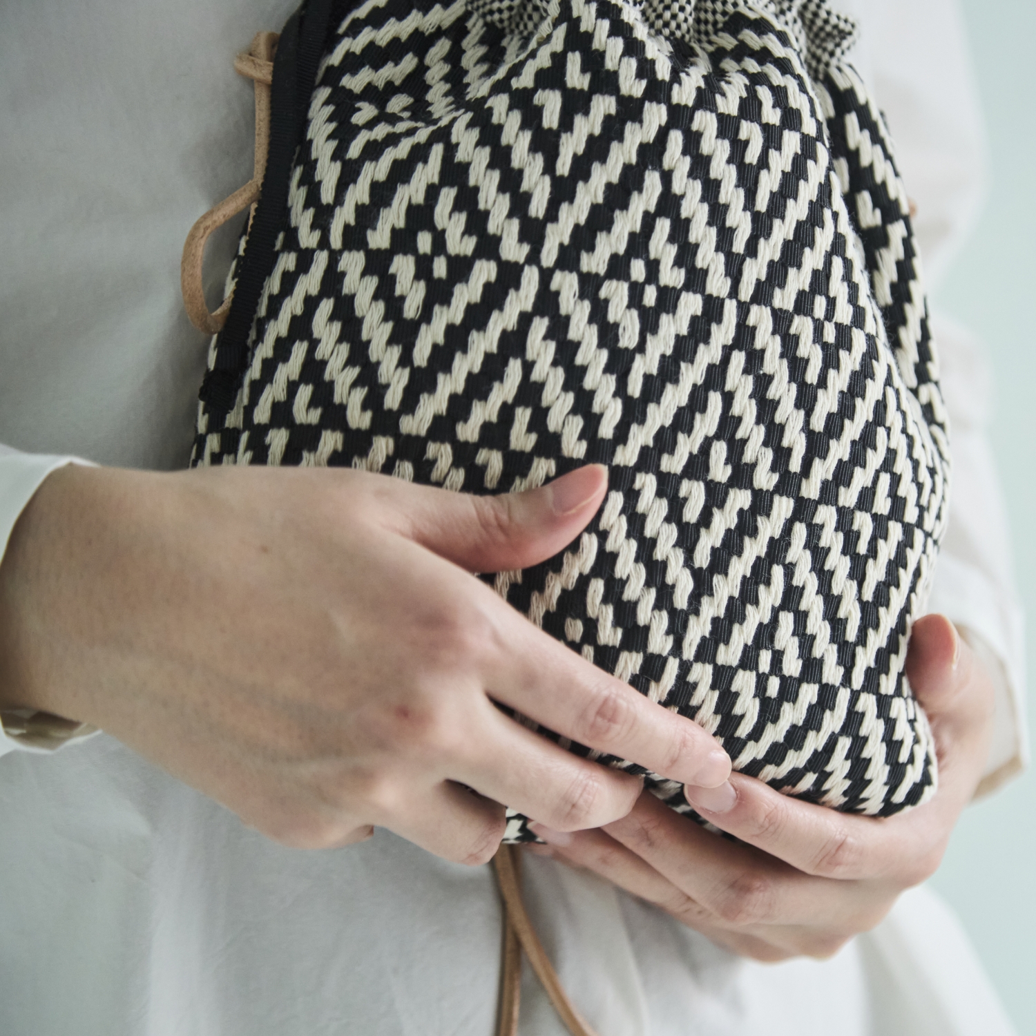 trois temps/リボン織の巾着ポシェット