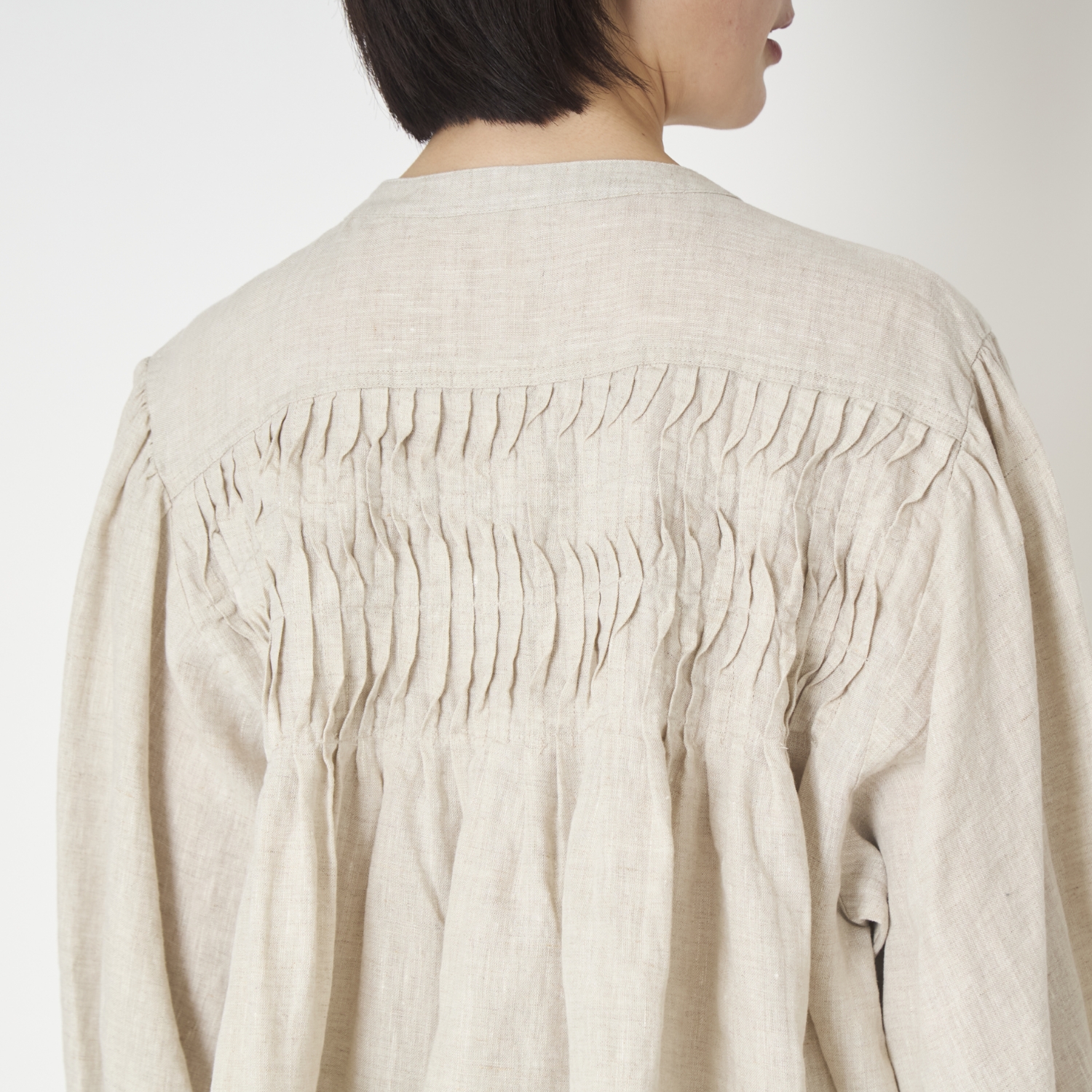 ubasoku/ウェーブピンタックブラウス