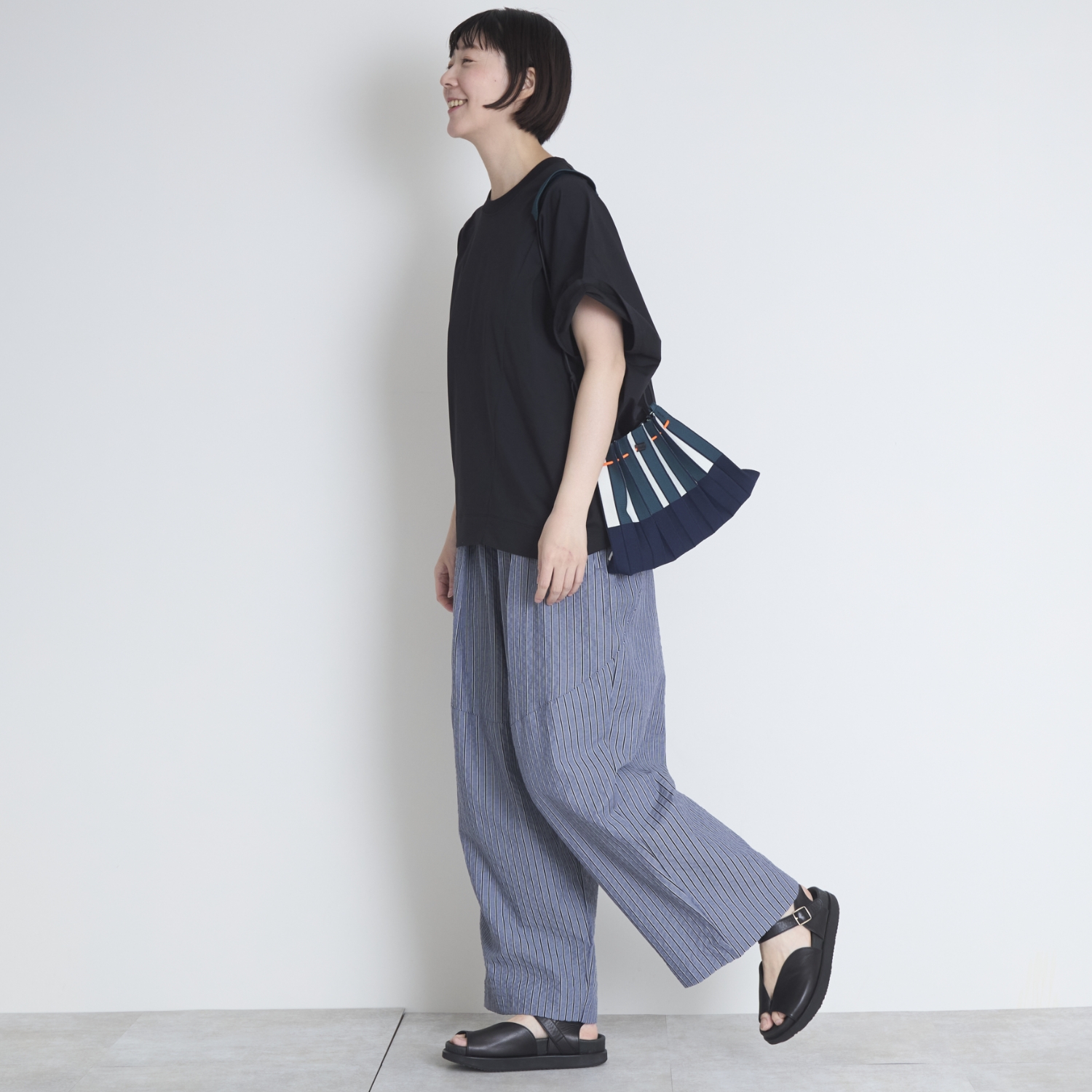Kilka/風が通るストライプのカーブパンツ